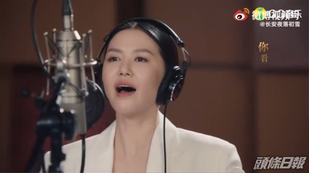 譚維維原與王力宏合唱電視劇《大決戰》的片尾曲《寸心》。