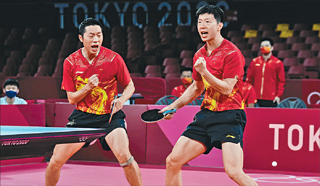 ■乒乓球金牌得主馬龍（右）及許昕。資料圖片