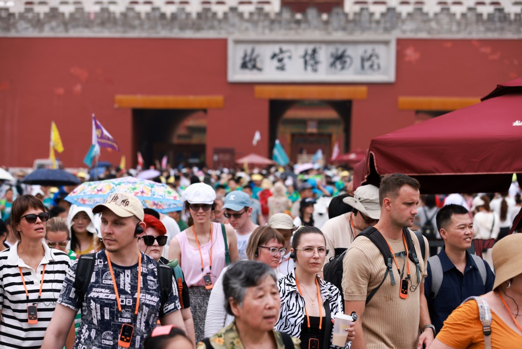 今年「五一」,入境旅客也大增超過一倍。 中新社 今年「五一」,入境旅客也大增超過一倍。 中新社