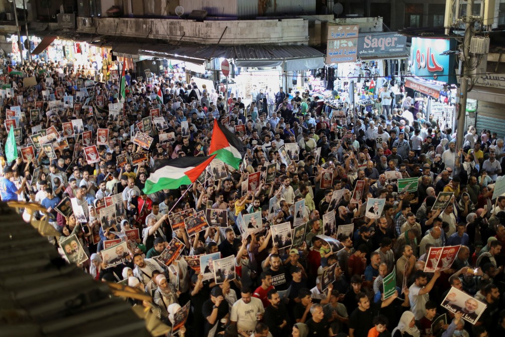 约旦示威者抗议哈尼亚被杀。路透社