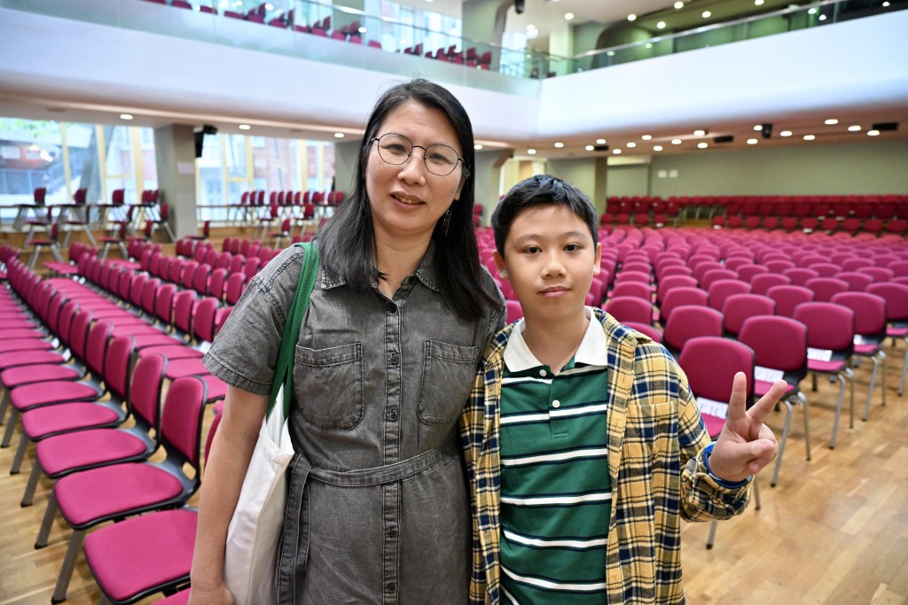 唐太稱,提早讓就讀小五的兒子參加中一簡介會,是希望盡早讓他感受競爭氛圍。蘇正謙攝 唐太稱,提早讓就讀小五的兒子參加中一簡介會,是希望盡早讓他感受競爭氛圍。蘇正謙攝