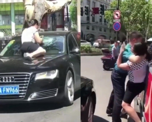 元配街頭捉小三,卻被自己老公鎖喉。(網圖)