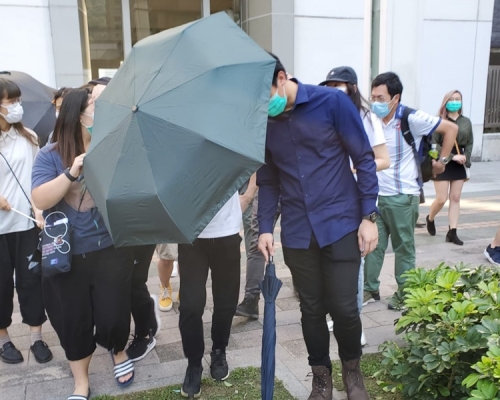 林昭明(深藍色裇衫)。葉君怡攝