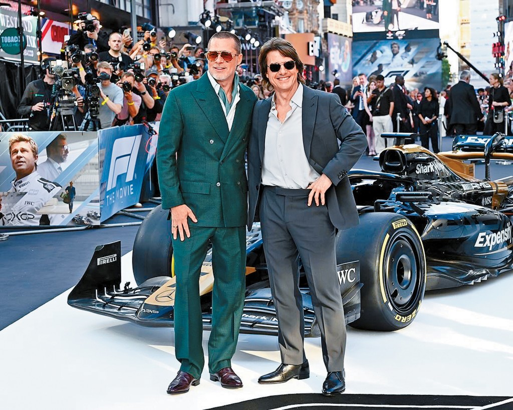 靚佬湯驚喜現身撐畢佬新片首映,2人更擁抱粉碎不和傳聞。