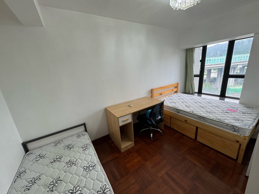 圖中房間空間闊落，擺放兩張睡牀後仍不見局促。