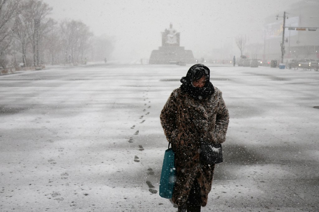 南韓首爾也降下大雪。路透社