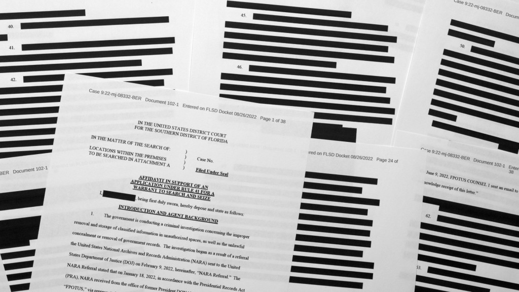 公開的文件有很多內容被塗黑加密。AP