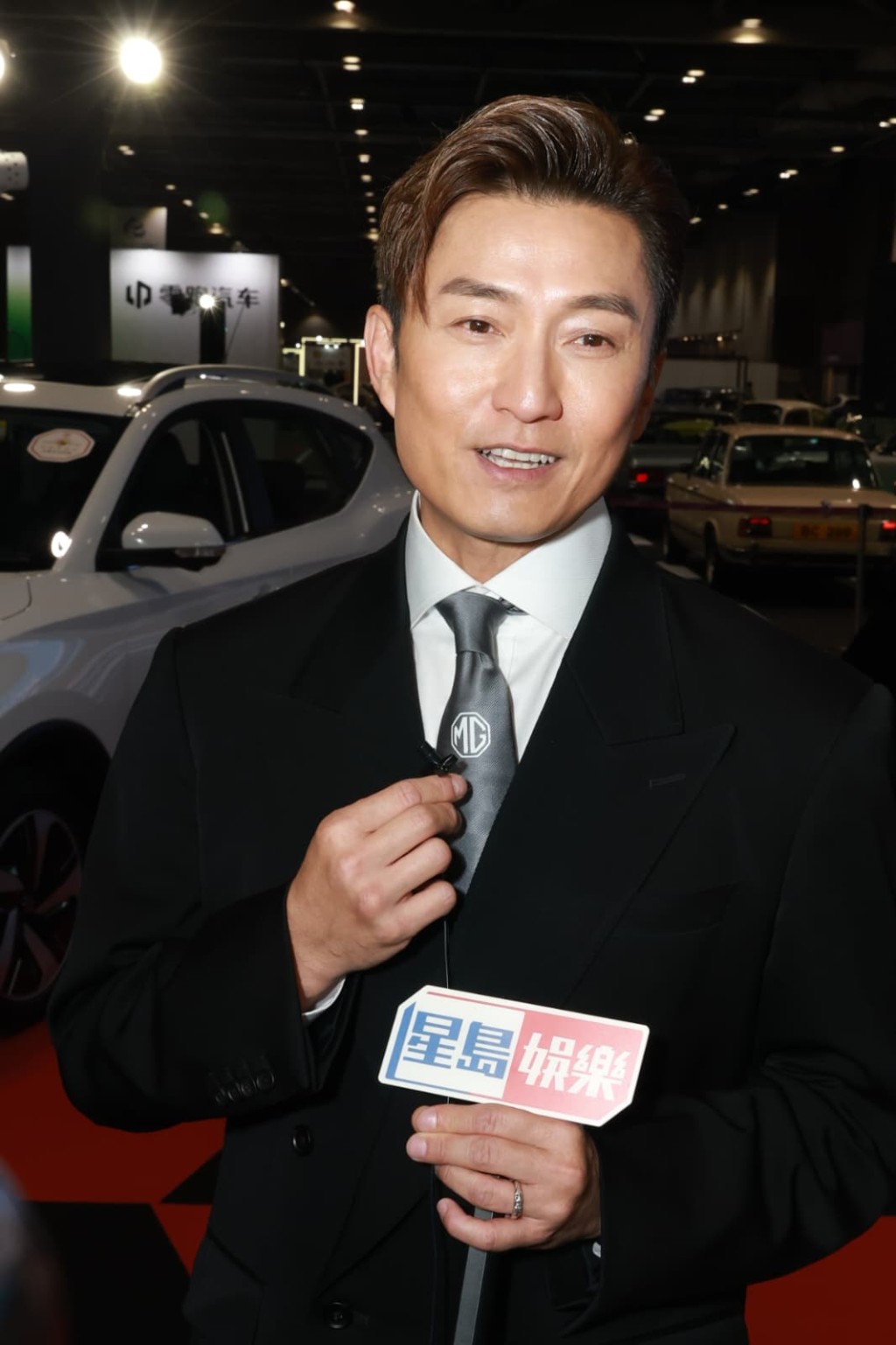 陈山聪开心形容儿子入到心仪小学，自己感到十分安慰。