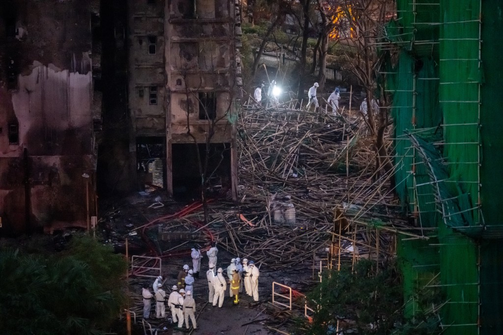 災難遇害者辨認組入火場搜遺骸。