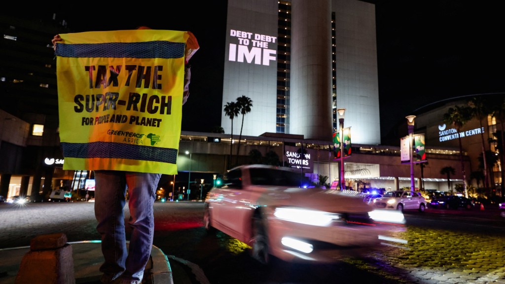 示威者要求G20峰会关注环保议题。 路透社