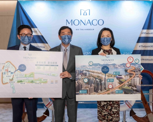會德豐黃光耀(圖中)稱,啟德MONACO料下月推。右為陳惠慈;左為楊偉銘