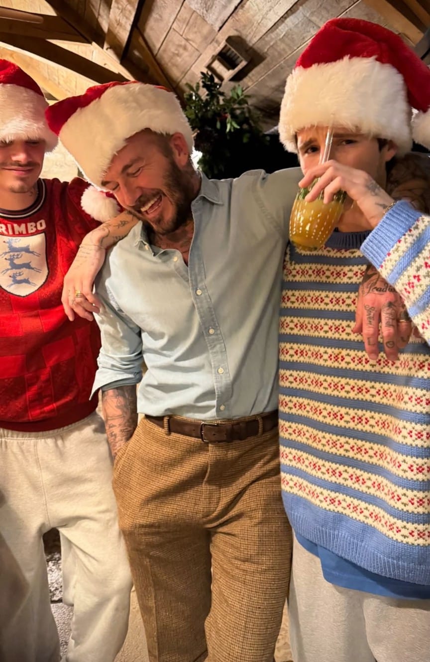 碧咸與次子Romeo(左)及Cruz(右)佳節歎返杯。 碧咸與次子Romeo(左)及Cruz(右)佳節歎返杯。