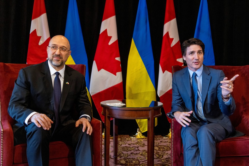 烏克蘭總理什梅加爾和加拿大總理杜魯多。 路透