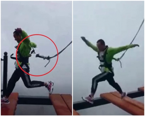 男子抵达最后一块木板时，身后的安全带竟然自动脱落。片段截图