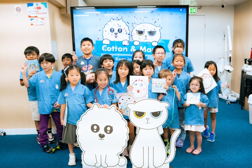  Junior Vet Academy小小动物医生体验日让小朋友穿上制服，齐齐进入兽医院体验兽医工作。（图片来源：受访者提供）