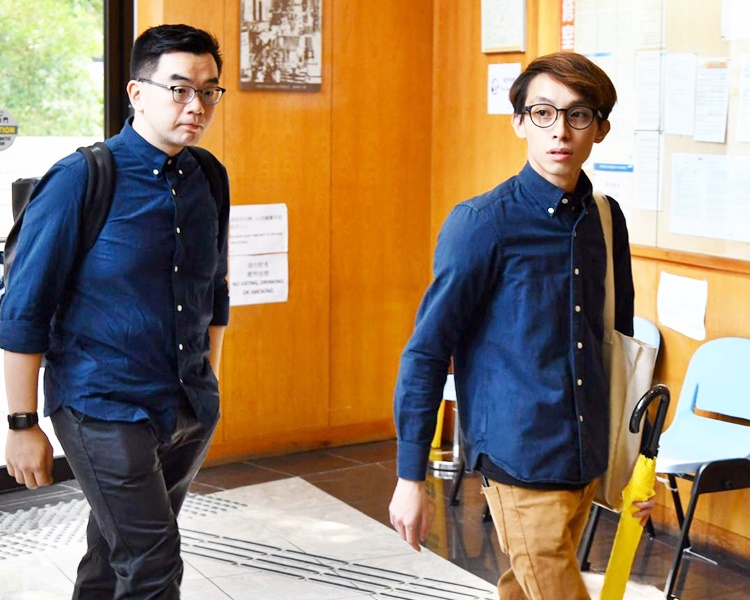 民陣副召集人陳皓桓(右)及黎恩灝出席聆訊。