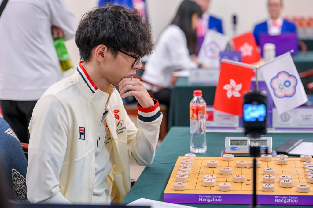 杭州亚运象棋混合团体赛，港队首夺铜牌创历史。 港协暨奥委会图片