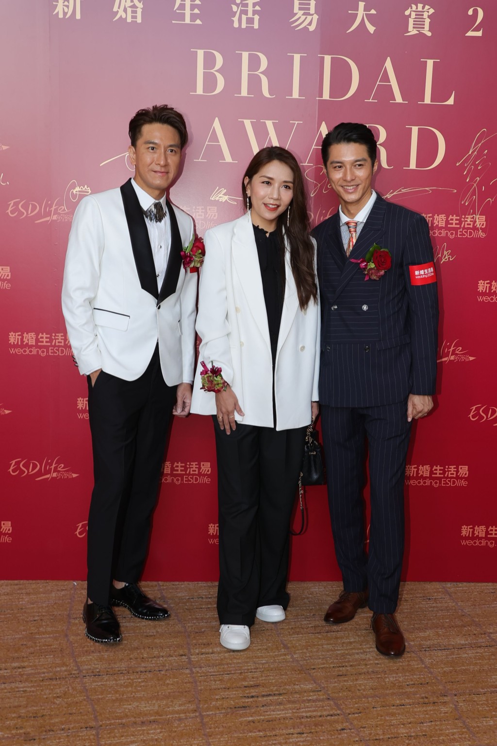 馬國明、黃嘉樂和太太江惠賢出席婚禮主題的頒獎活動。