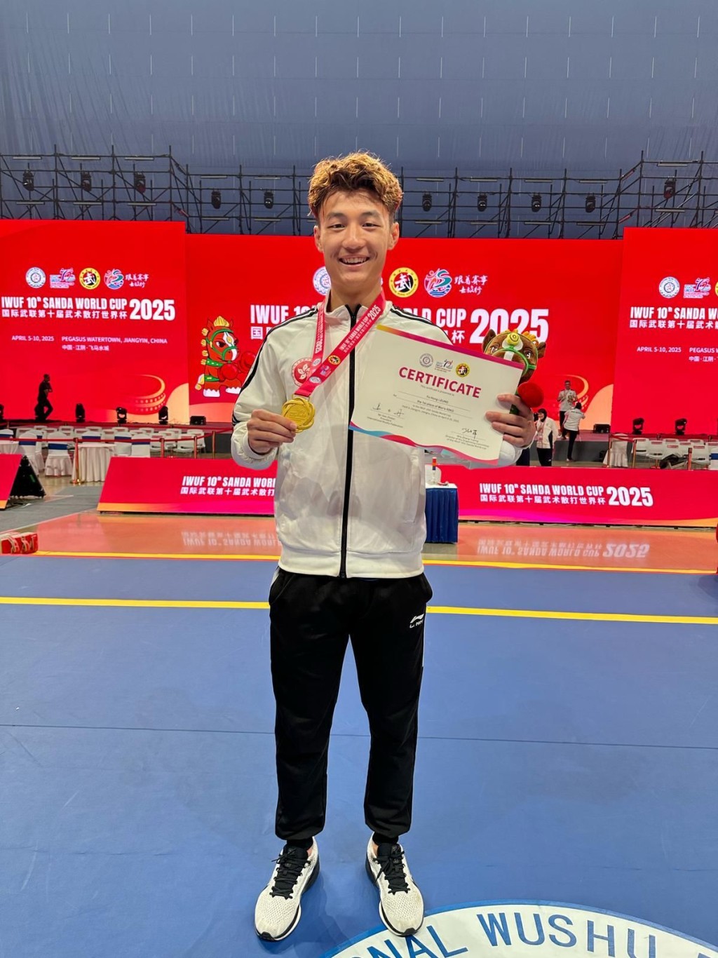 梁宇航於男子60公斤級勇奪金牌。中國香港武術聯會圖片
