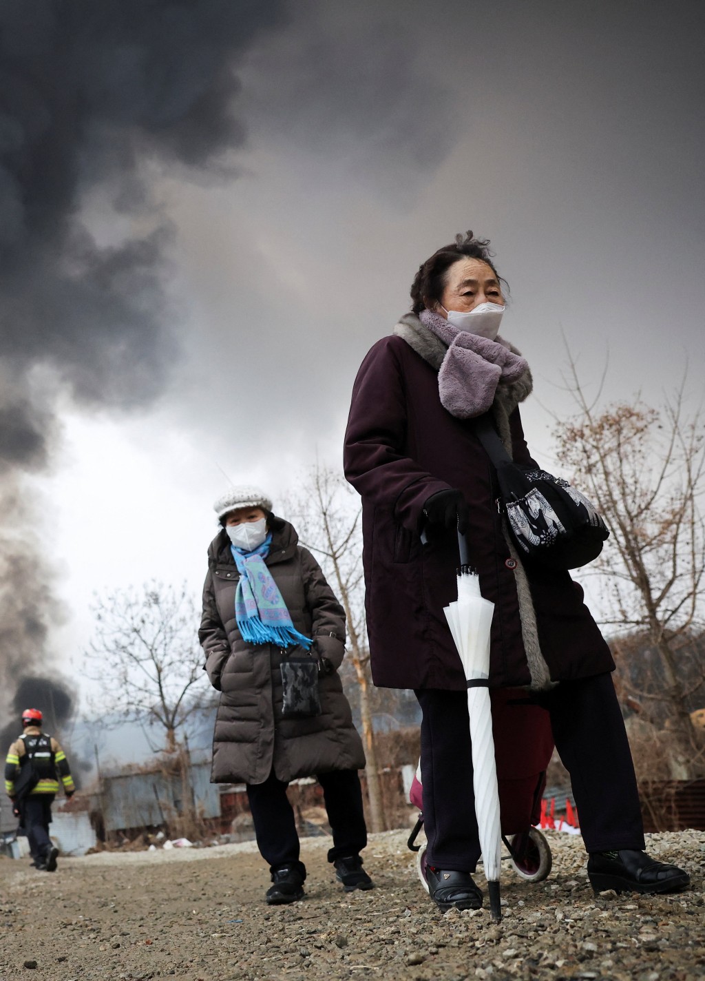 居民撤離家園。路透社