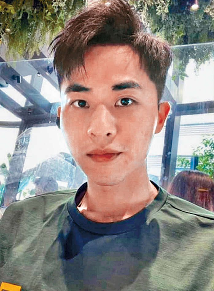 邝港智