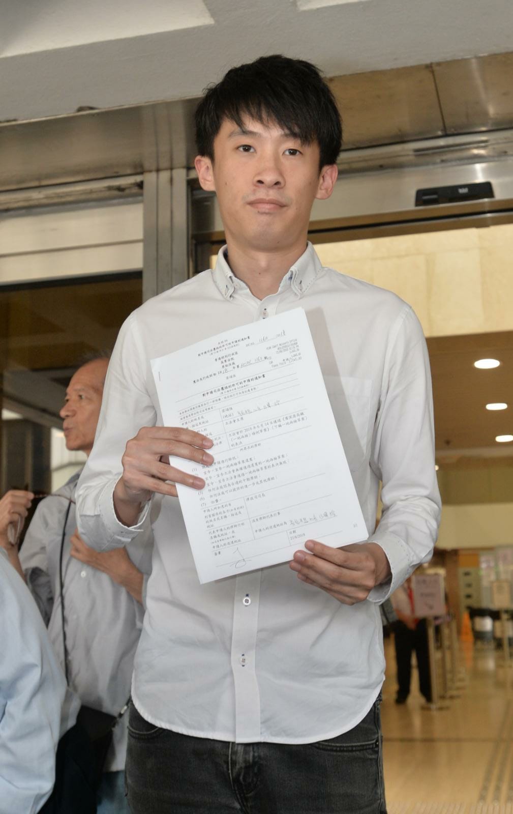 梁頌恆申請司法覆核，要求法庭頒令一地兩檢草案為違憲。陳浩元攝