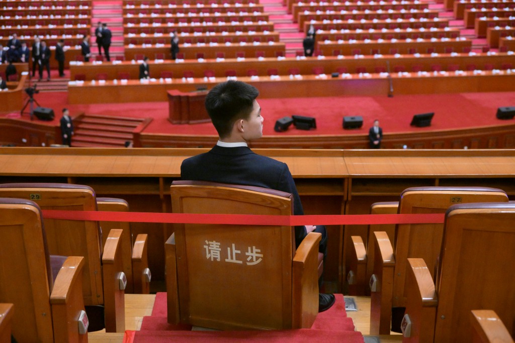 今晨全國政協十四屆二次會議在北京人民大會堂舉行閉幕會。蘇正謙攝