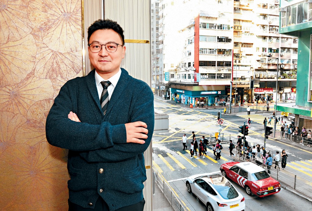 梁進指修例可提升業主對大廈管理關注度。資料圖片