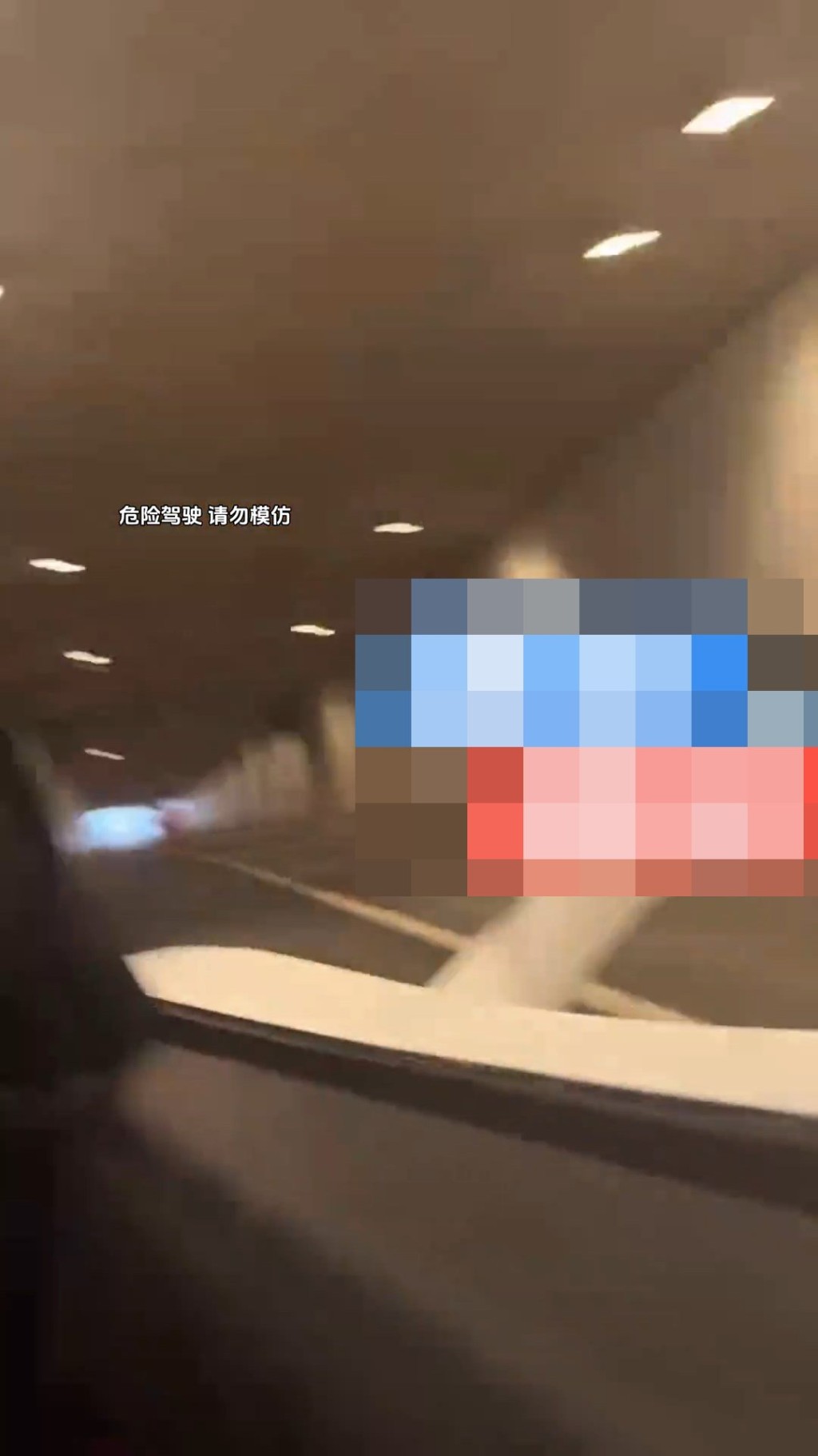 車行人員拍片期間,插播麥拿倫疑似出事的錄影。 車行人員拍片期間,插播麥拿倫疑似出事的錄影。