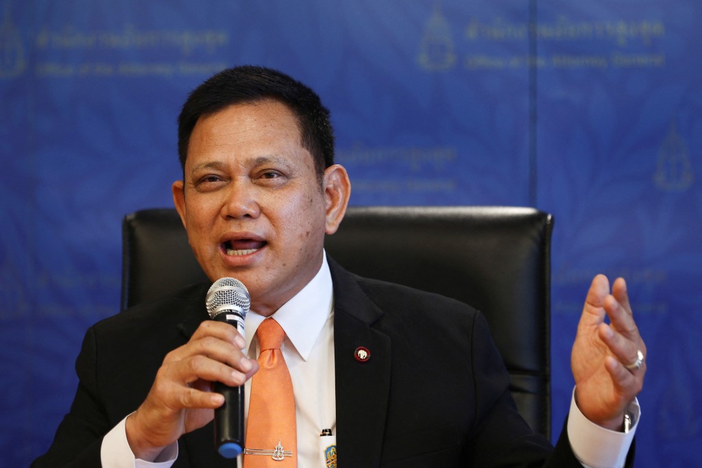 泰国总检察长办公室发言人披拉古纳宣布起诉他信。路透社