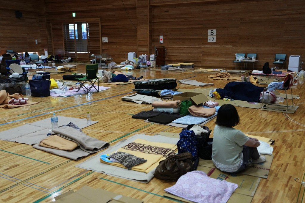8,262人分別入住155個避難所。美聯社 8,262人分別入住155個避難所。美聯社