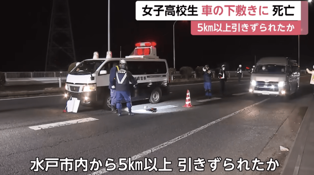 日本警方在车辆行经路段调查。日本电视新闻画面