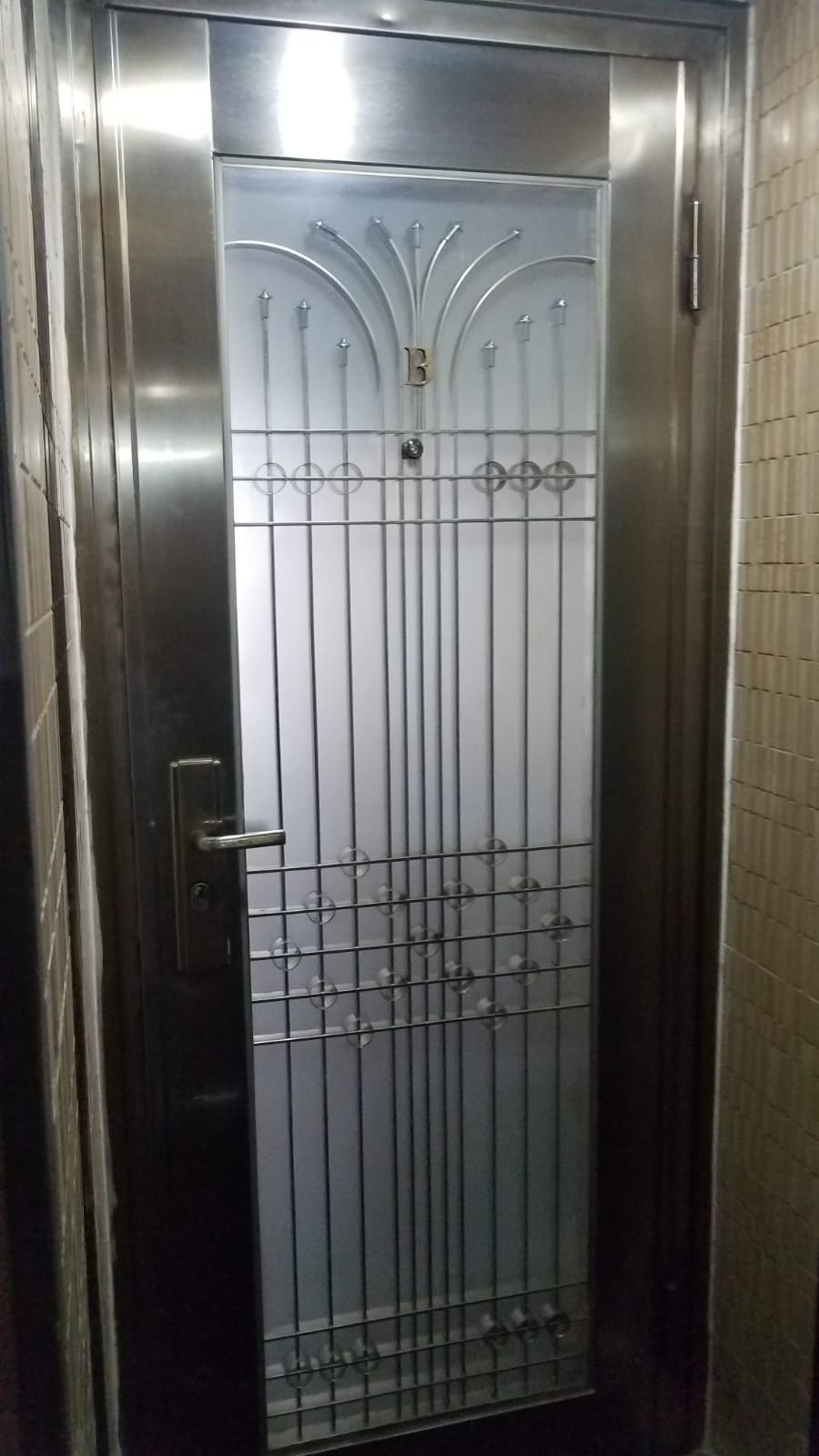 疑是中槍男子的寓所。 歐陽偉光