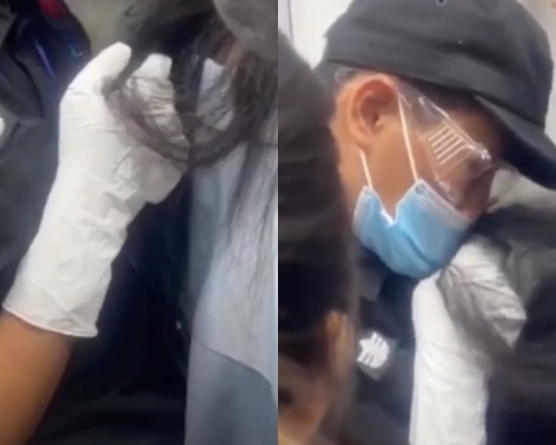 一名身穿地铁安全员服装的男子，对一名女乘客做出不雅行为。网图