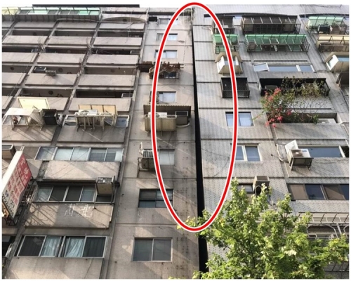 台北市信義區再有大樓傾斜。網圖
