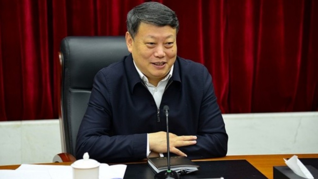 唐一軍提早退居二綫。