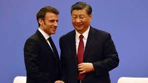 法国总统马克龙（左）同中国国家主习近平会晤后，被指对美立场明显改变。