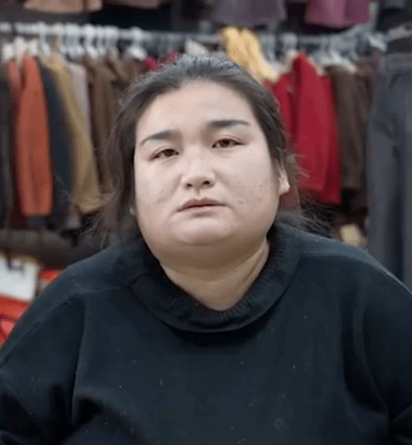 女童田洛溪生母李婷婷。