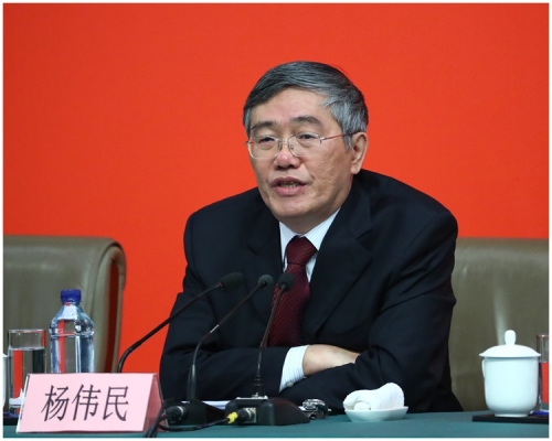 杨伟民为十九大报告解画。新华社