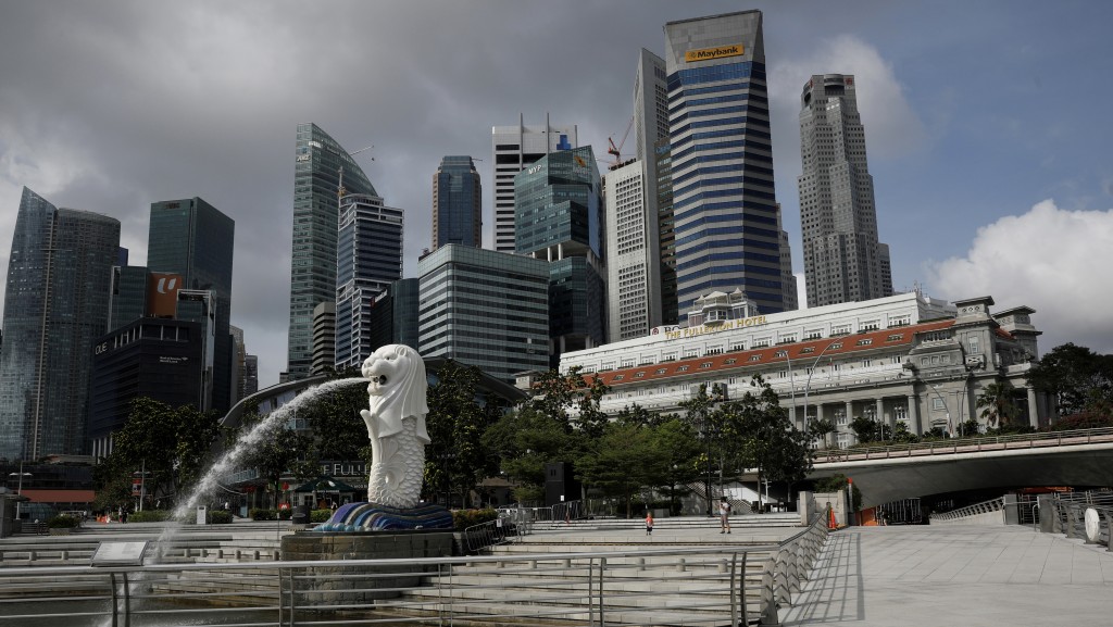 新加坡獅身魚尾像。 路透社
