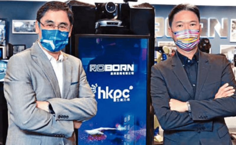 生產力局總裁畢堅文（左）與路邦數碼行政總裁潘嘉陽簽署技術代理協議，推動「kNOw Touch無觸按鈕」普及應用。