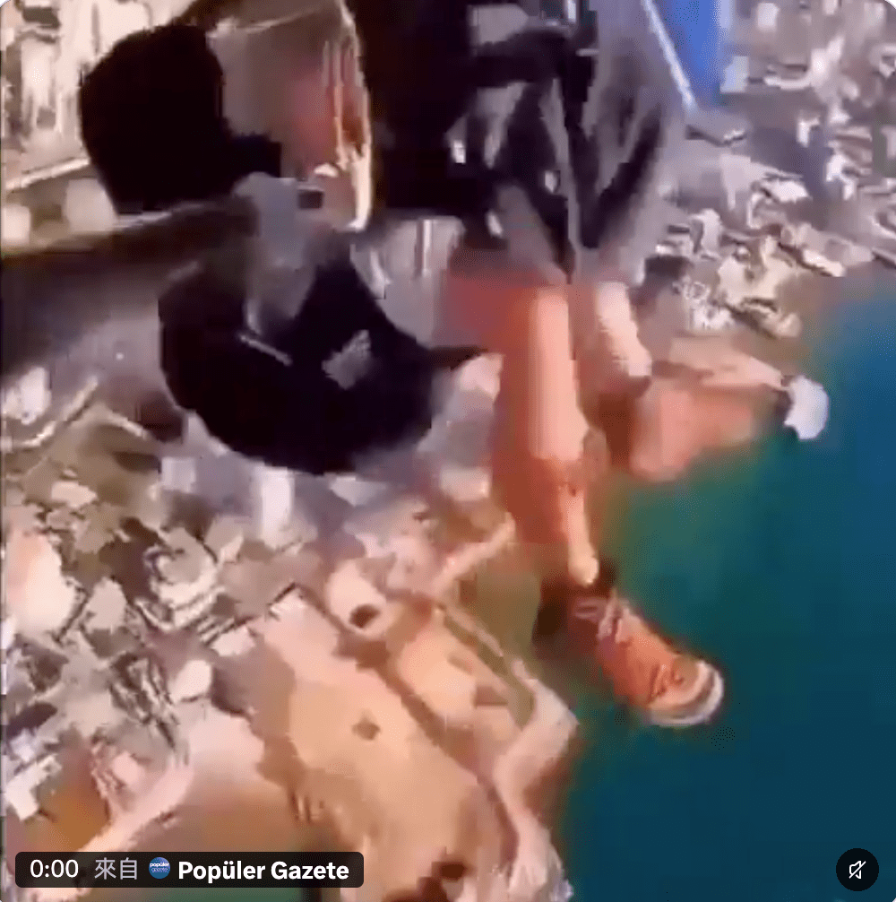 馬曼支撐一段時間後鬆手,從高空急墜。 馬曼支撐一段時間後鬆手,從高空急墜。