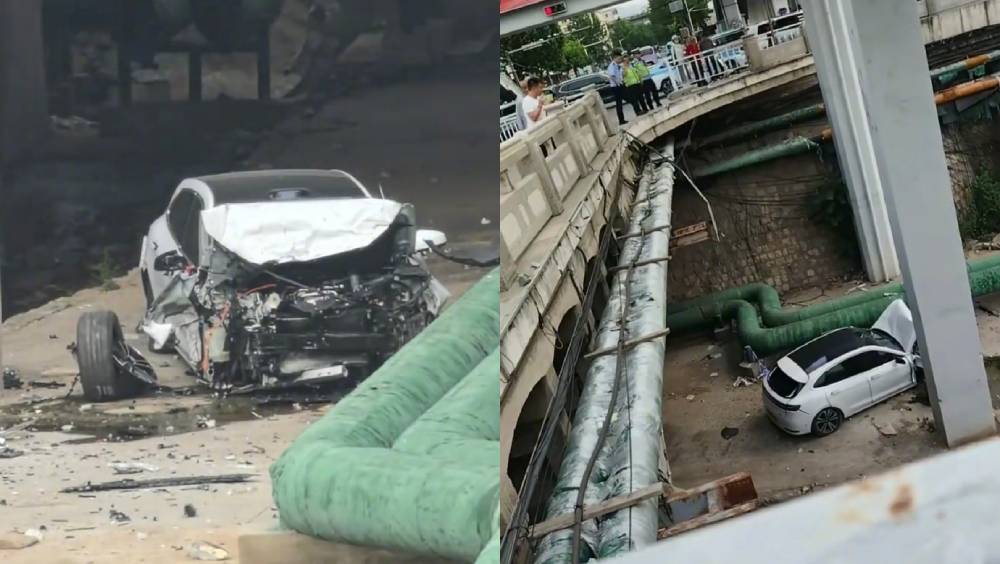 山西私家車失控撞斷石欄，從數米高處飛墮，致車頭全毀，兩女傷者送院救治。