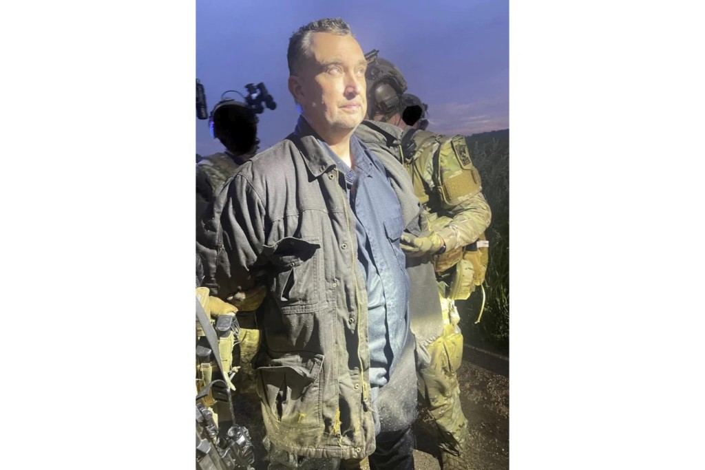 警方拘捕涉嫌槍殺議員的博爾特。美聯社 警方拘捕涉嫌槍殺議員的博爾特。美聯社