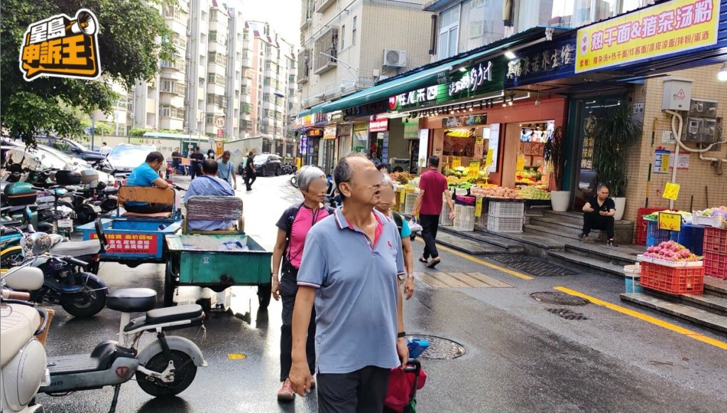 在拗下村菜市場，目測所見有不少港人來買菜。