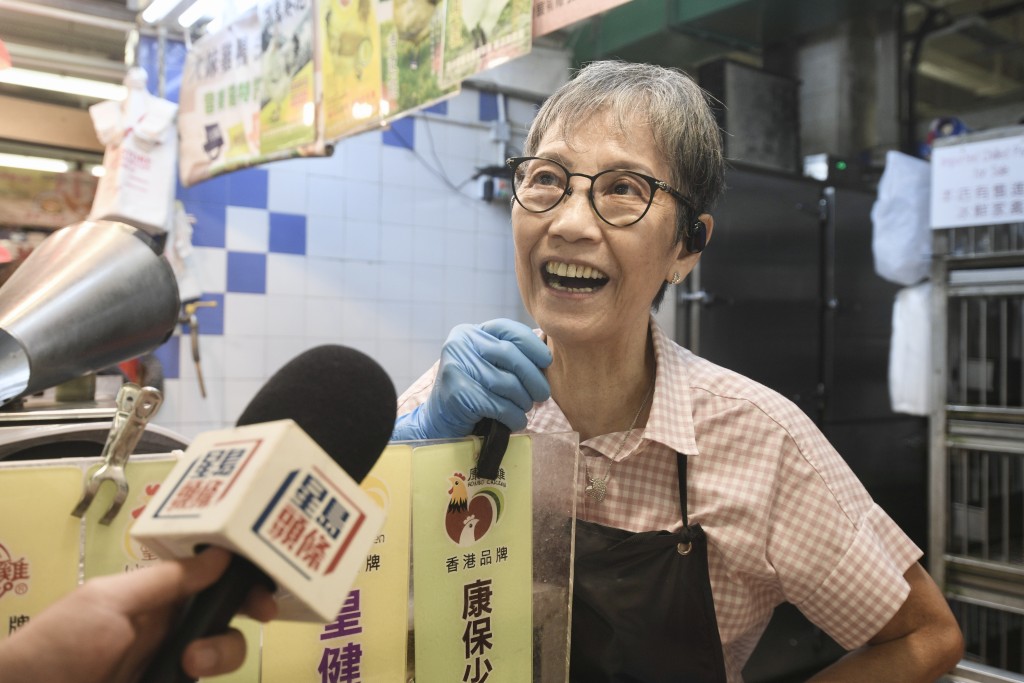 梁女士。