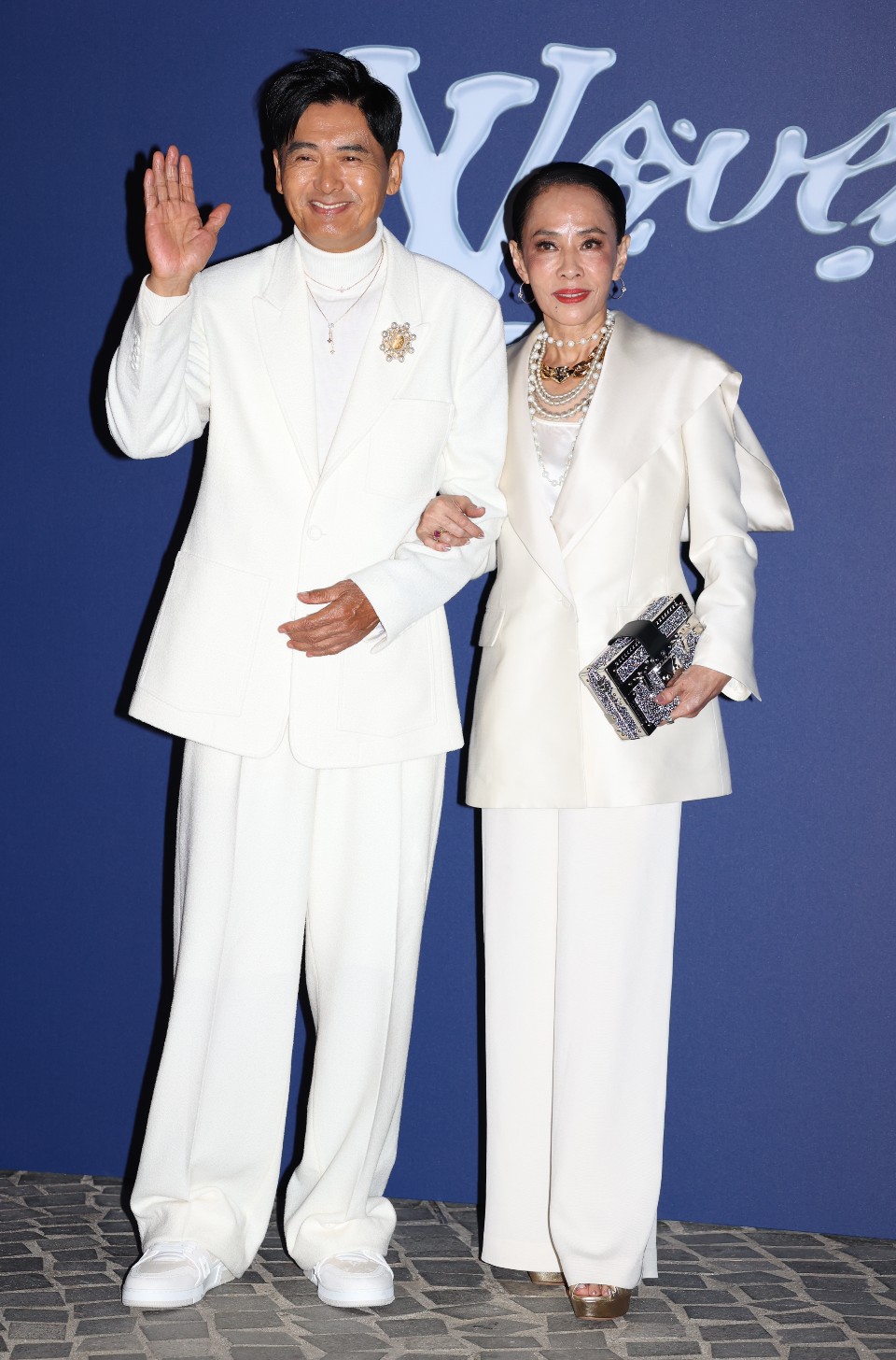 周润发夫妇出席LV香港时装Show。
