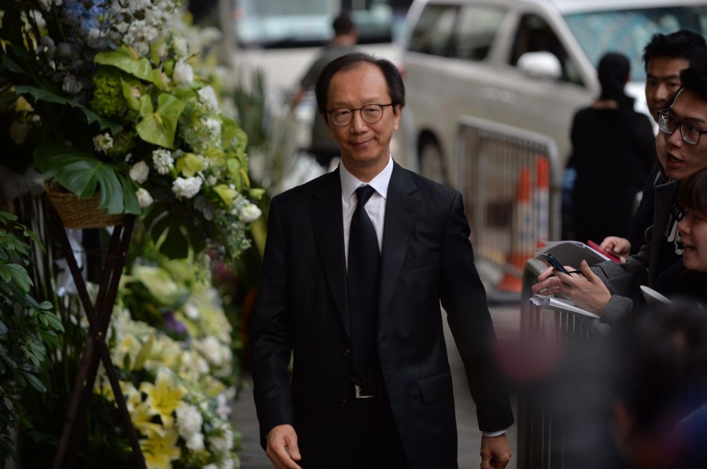 前財政司司長梁錦松。