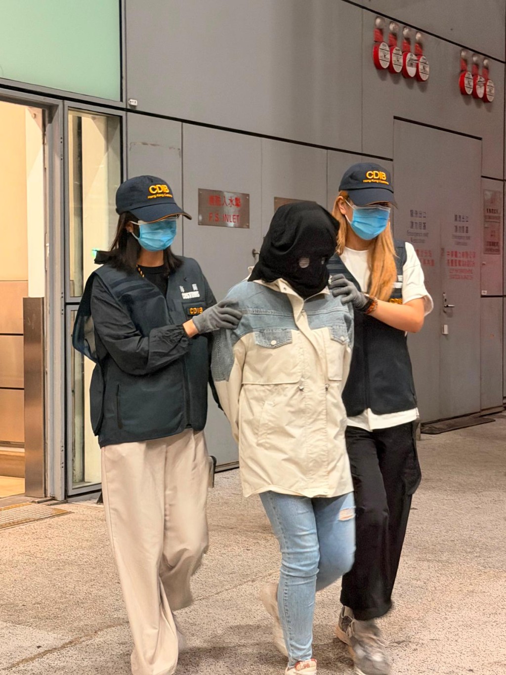 第二宗案件的被捕人士(中)。 第二宗案件的被捕人士(中)。