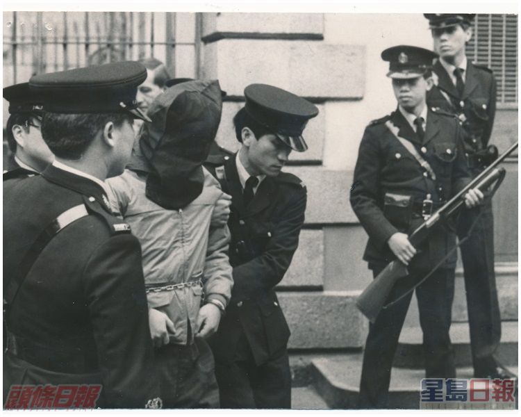 匪徒出庭應訊,警方嚴密佈防。資料圖片